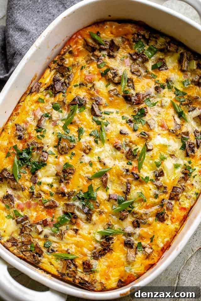 A baked Denver Omelet fresh out of the oven and in a the baking dish