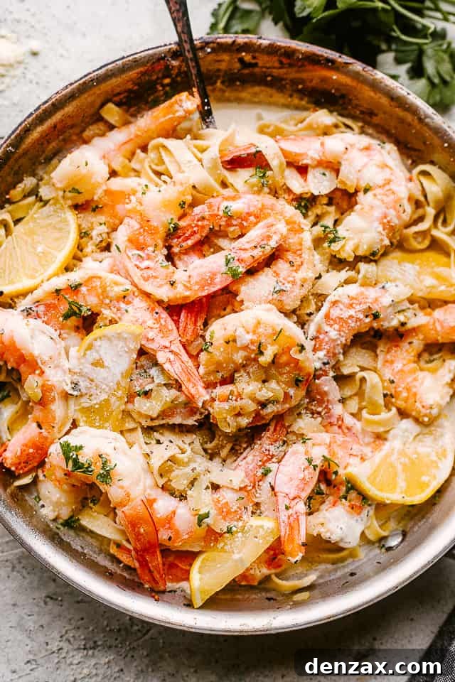 Creamy Shrimp Alfredo Pasta in a pan ready to be served