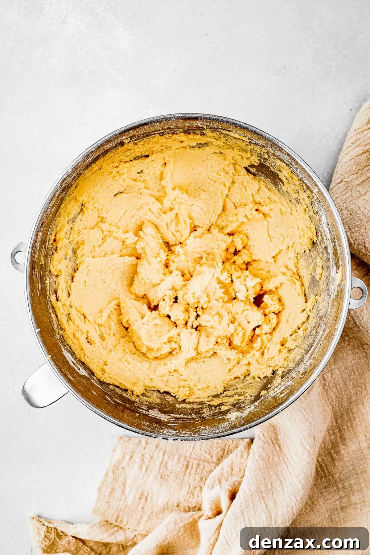 Overhead shot of a mixing bowl full of cookie dough.