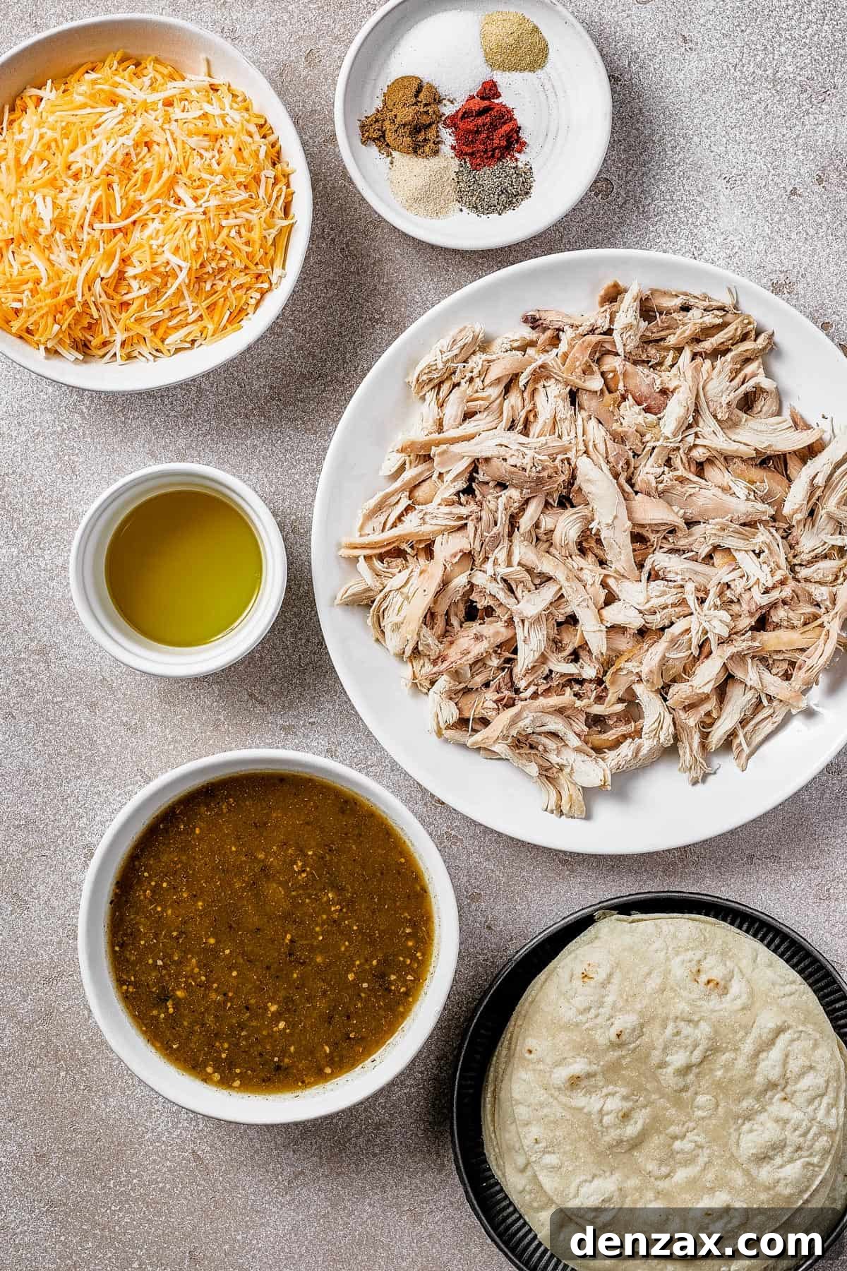 Clockwise, from top left: Shredded cheese, spices, shredded chicken, tortillas, salsa verde, olive oil.