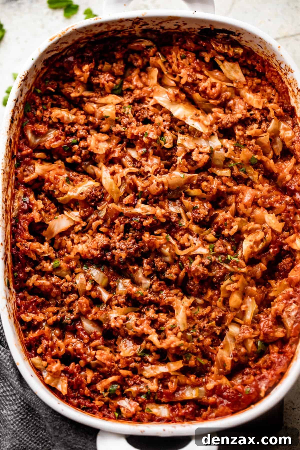overhead shot of cabbage roll casserole in a baking dish.