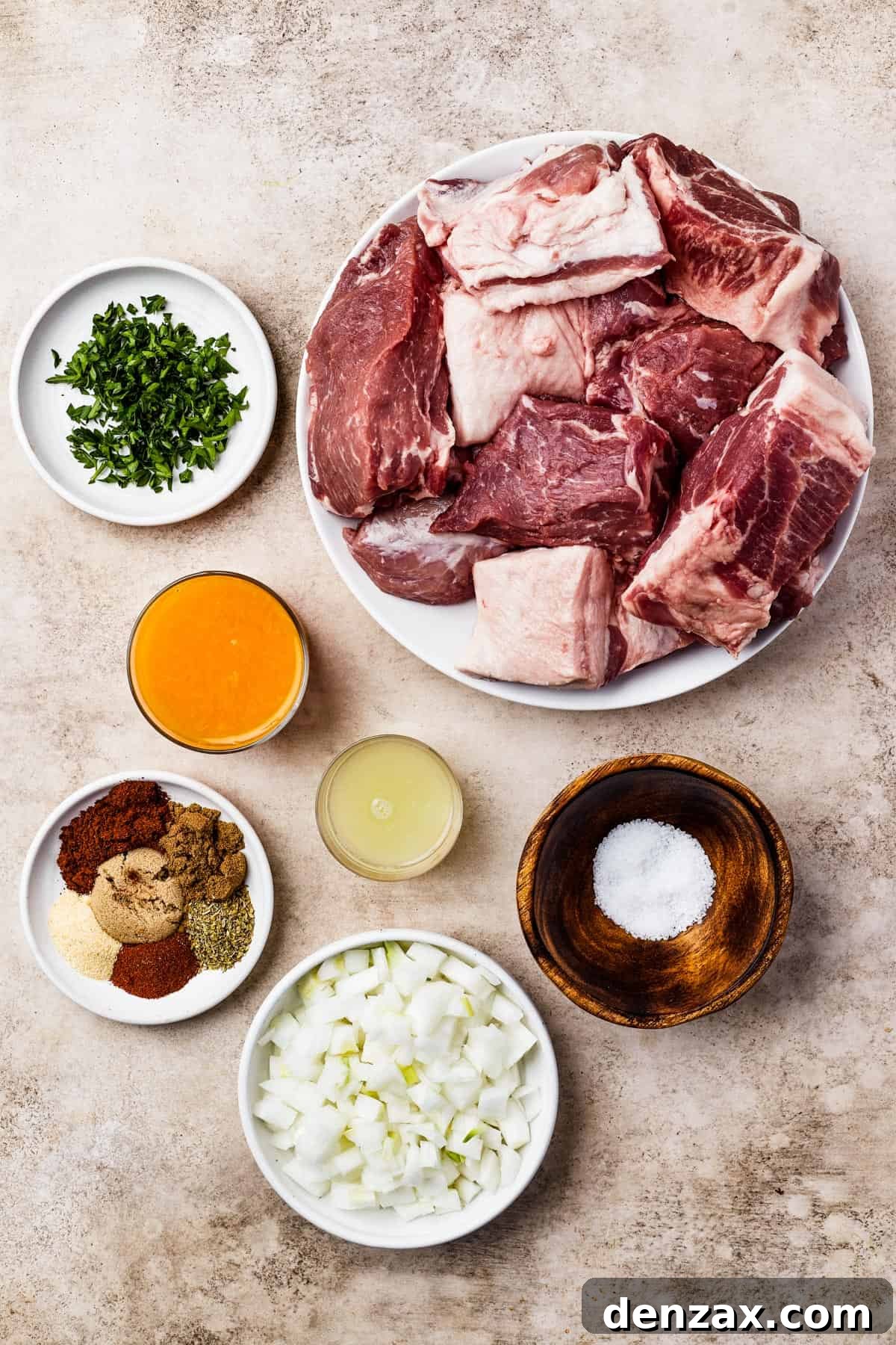 From top left: Chopped cilantro, pork butt, orange juice, lime juice, seasonings, salt, white onion.