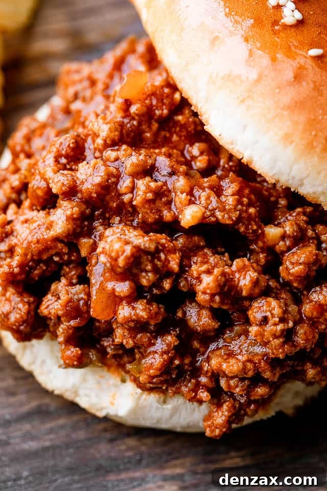 Close up of a sloppy joe on a buttery bun.