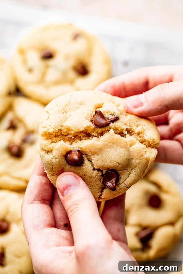 Breaking a cookie apart Breaking a cookie apart with your hands.