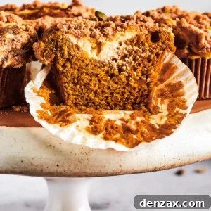 Pumpkin muffins arranged on a cake stand.