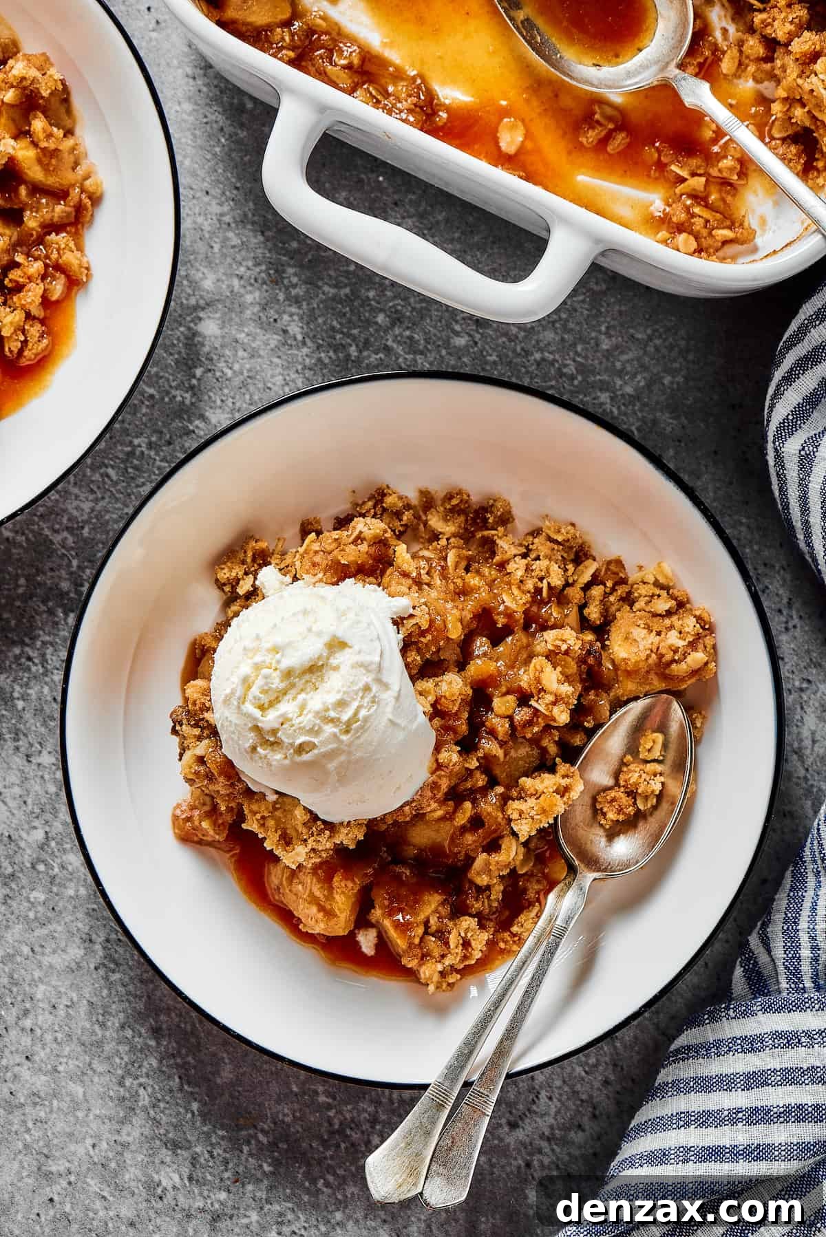 Ice-cream topped apple bake, with an oat topping.