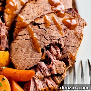 Pot roast with gravy and vegetables.