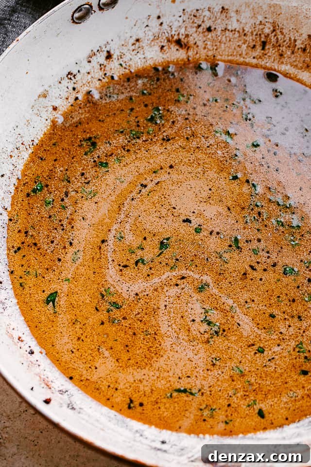 balsamic sauce cooking in a skillet