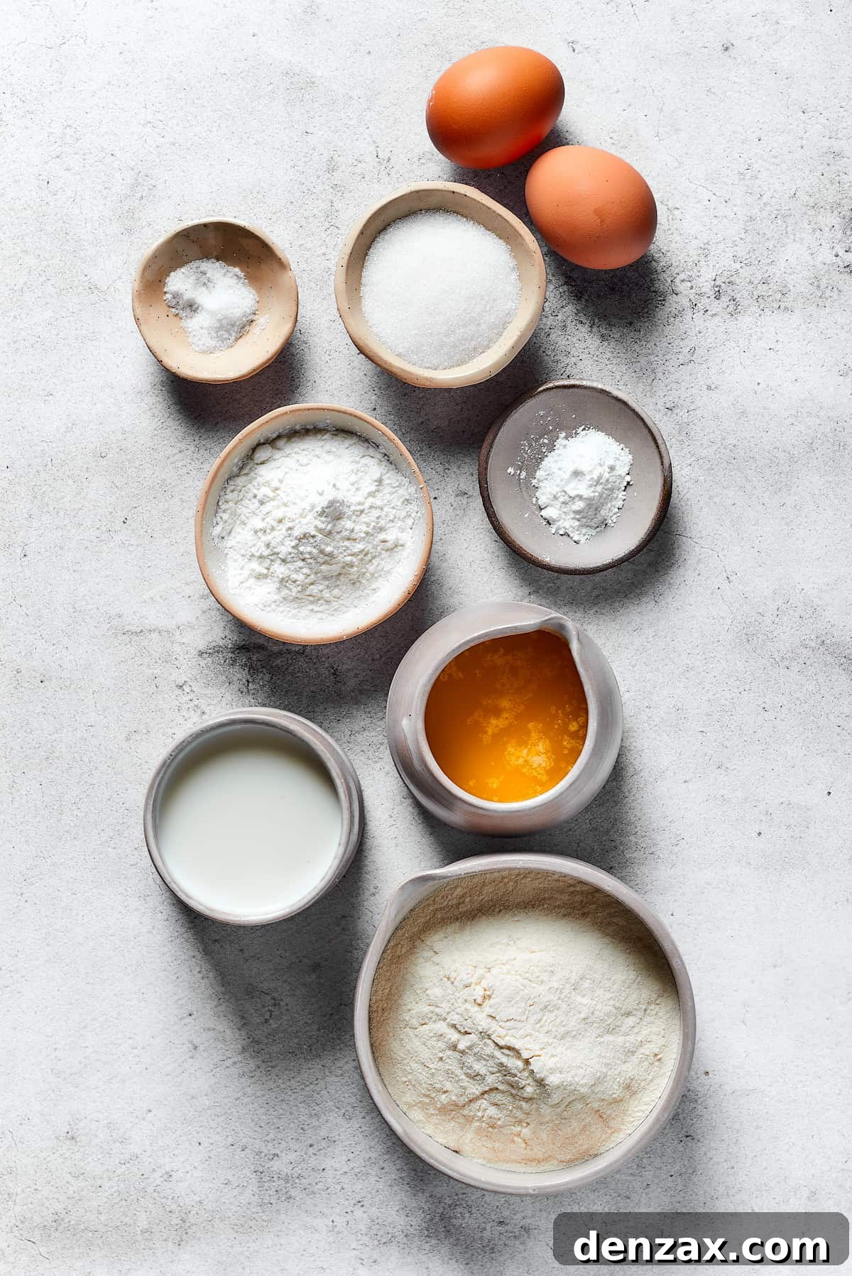 Treat yourself to a light, buttery, fluffy breakfast made from scratch, with this Easy Waffle Recipe - and don’t forget the syrup! From top: Two eggs, baking powder, sugar, salt, cornstarch, melted butter, buttermilk, flour.