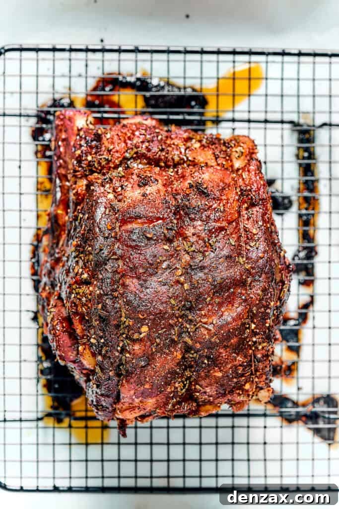 Roasted prime rib on a wire rack.