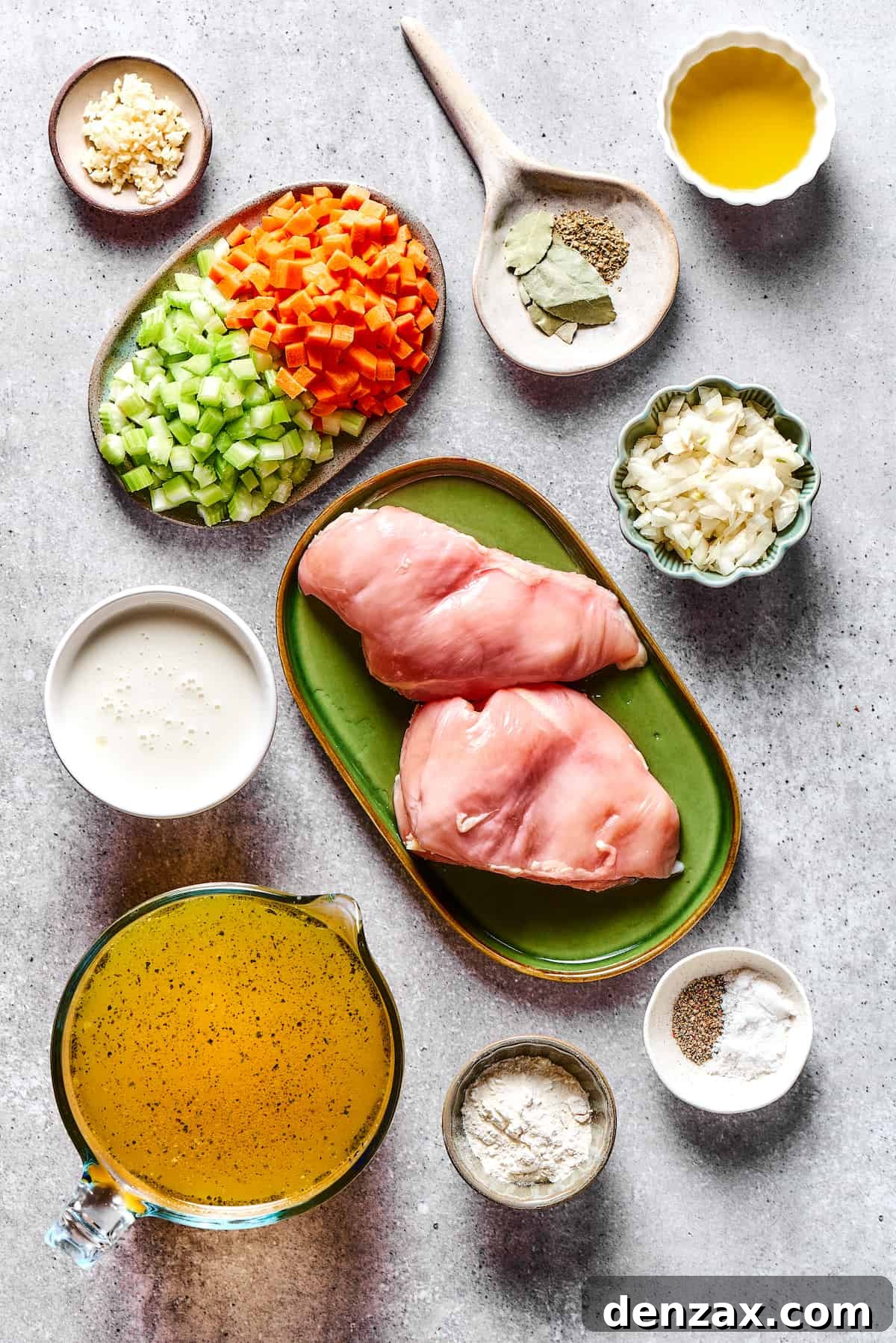 Chicken and dumplings ingredients measured and arranged on a countertop.