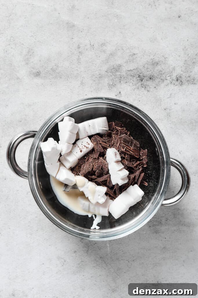 Chocolate and marshmallows in a pot.