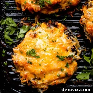 melted cheese over portobella mushrooms on the grill