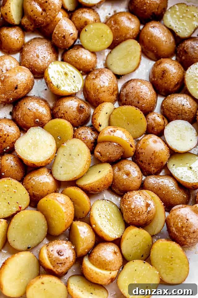 Balsamic Sheet-Pan Chicken and Potatoes Recipe 4 top view of yellow potatoes cut in half