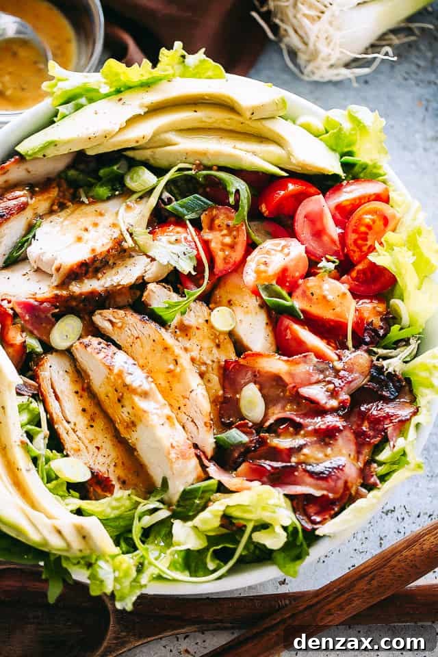 Chicken bacon avocado salad in a bowl.