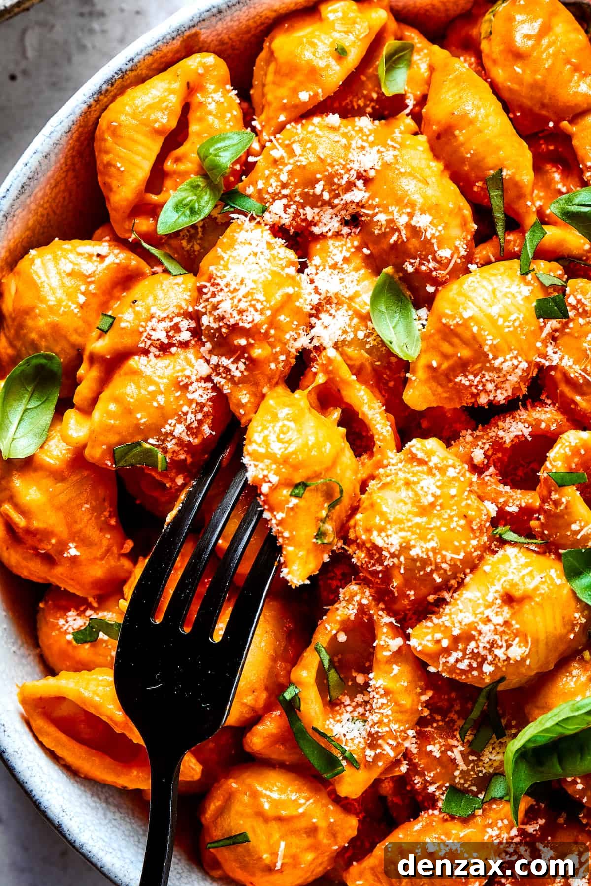 A fork in a bowl of Gigi Hadid pasta.