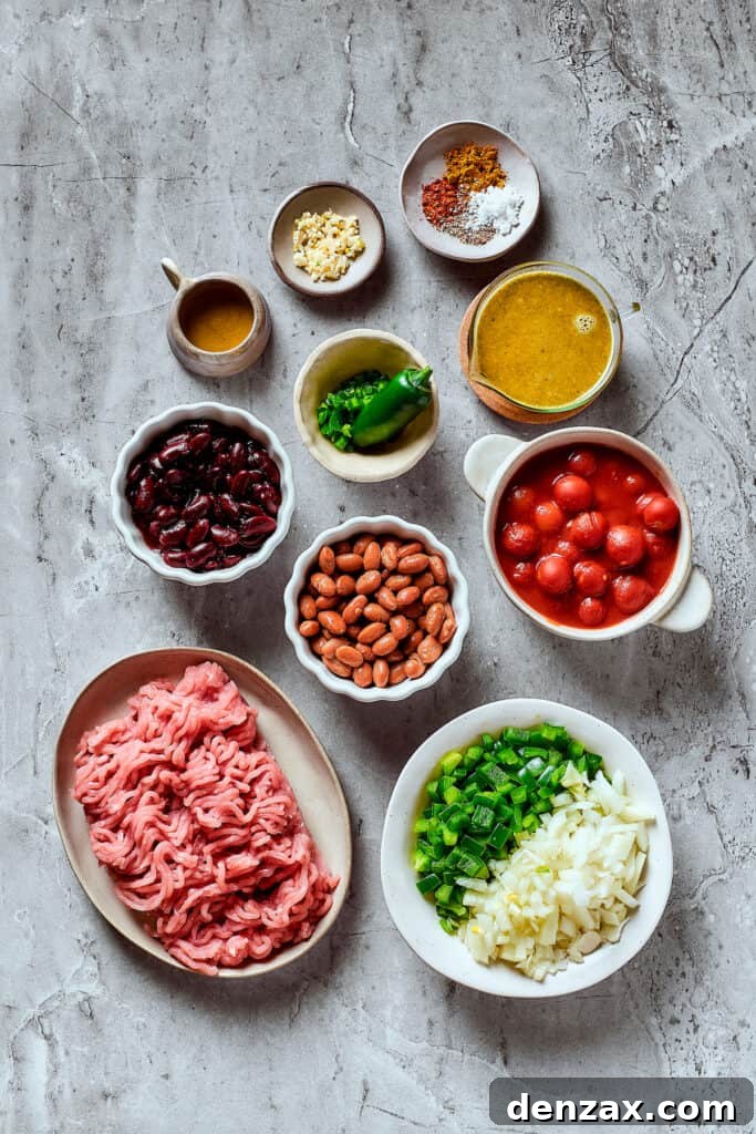 Turkey chili ingredients measured and arranged on a work surface.