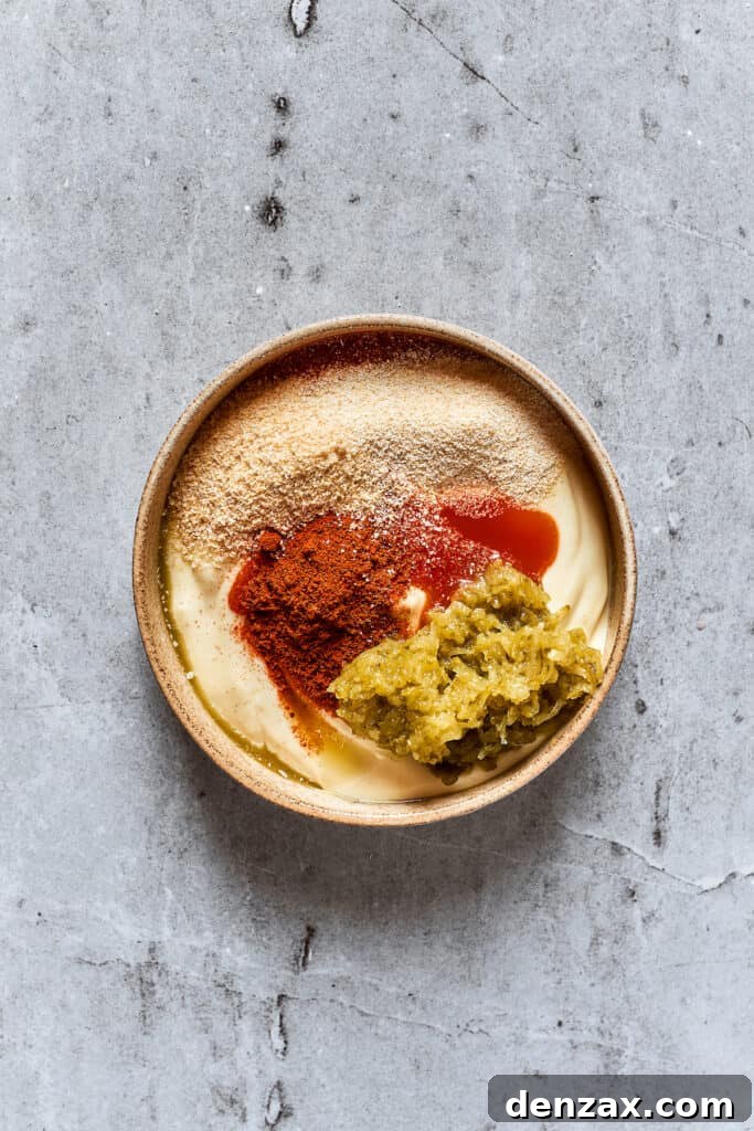 Spicy mayonnaise ingredients in a bowl.