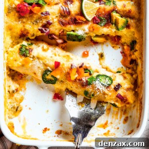 A serving fork resting in a dish of homemade enchiladas.
