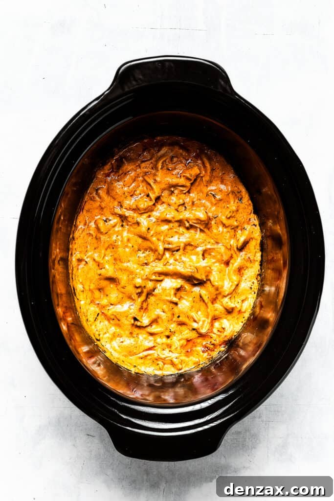 With its creamy, cheesy, spicy goodness, Crockpot Buffalo Chicken Dip is a favorite for parties, game days, movie night, and more! Cooked crockpot buffalo chicken dip.