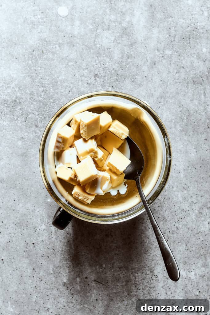 Melting white chocolate chunks for ganache.