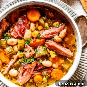 Overhead image of ham bone soup served in a bowl.