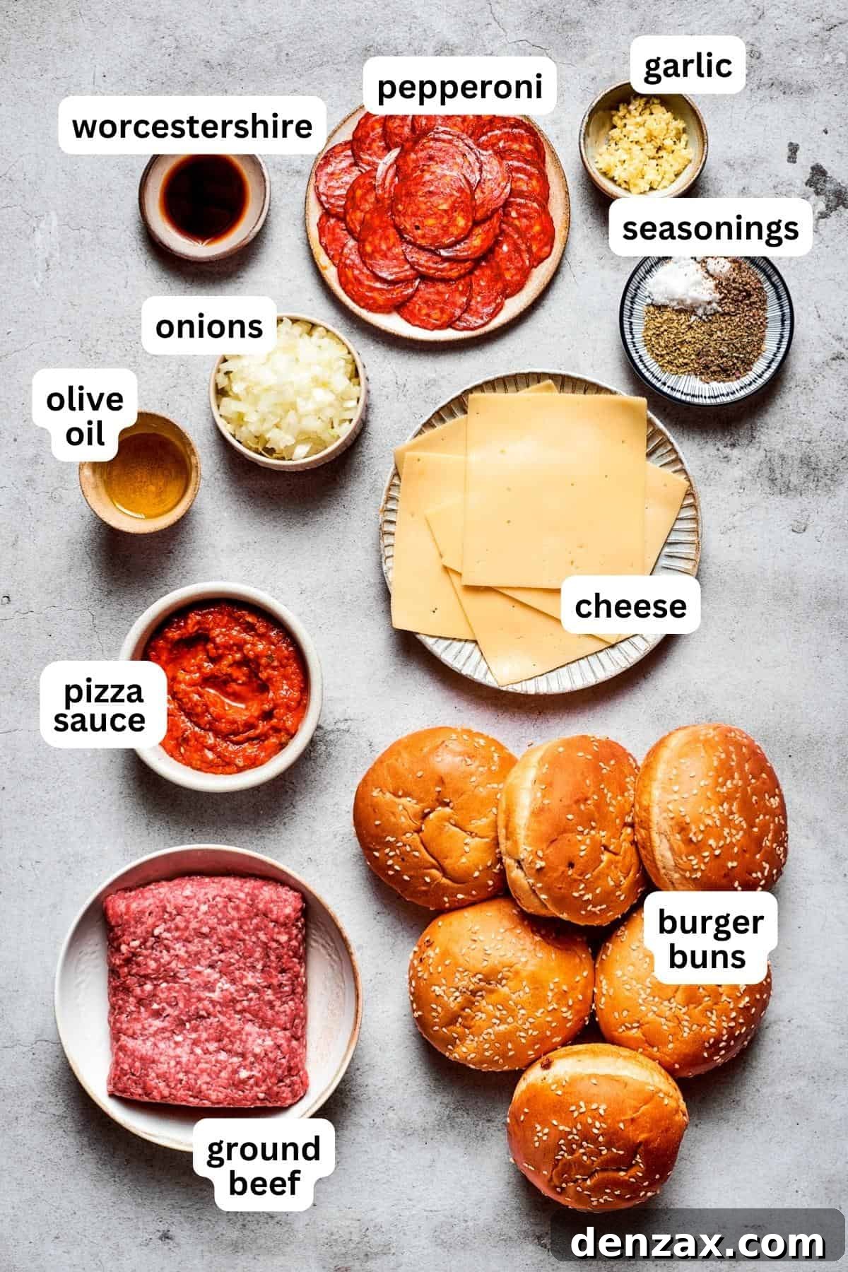 This easy Pizza Burger recipe is sure to become a family favorite! Meat filling is layered with pepperoni and melty mozzarella cheese. Overhead image of Pizza burger ingredients, labeled.