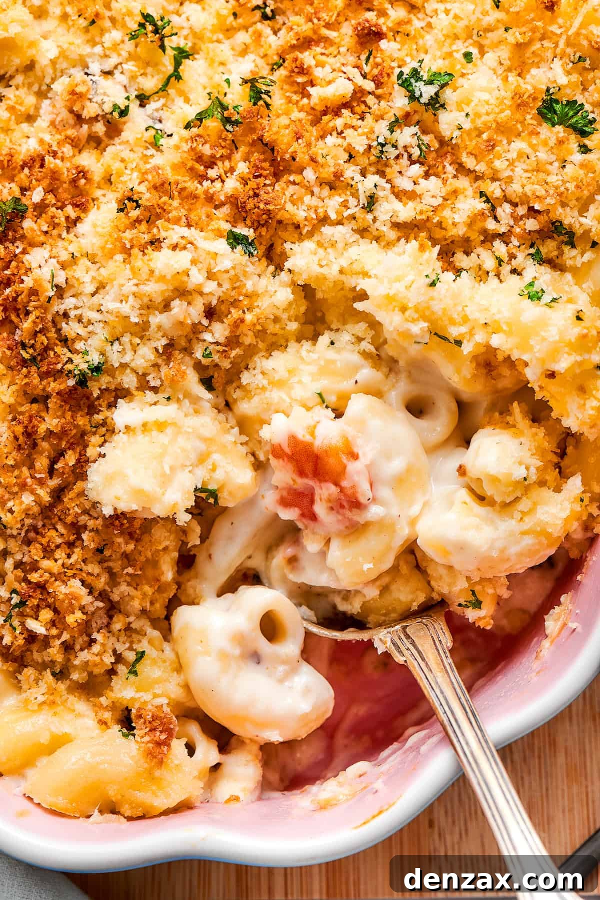 Close up of a spoonful of seafood mac and cheese Close up of a spoonful of seafood mac and cheese