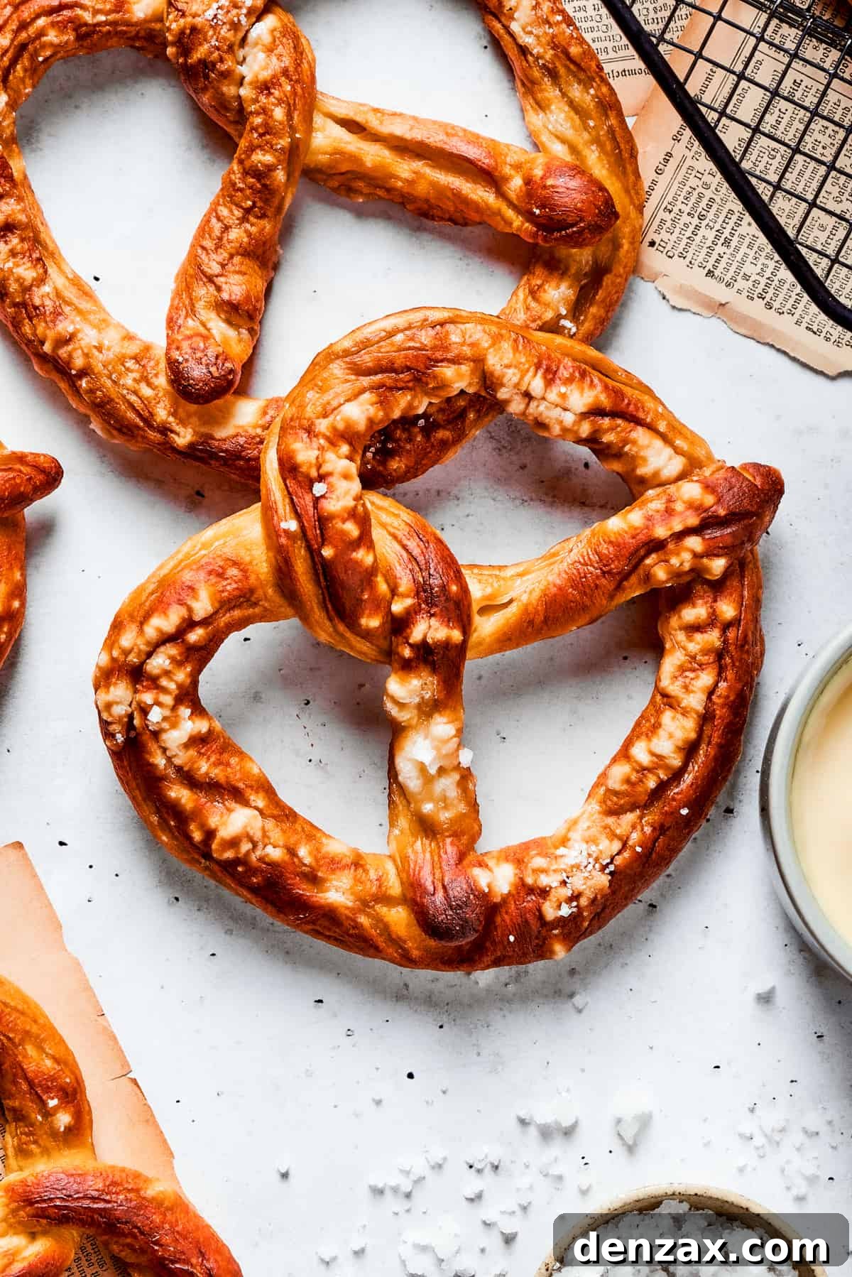 A top down shot of a baked soft pretzel.
