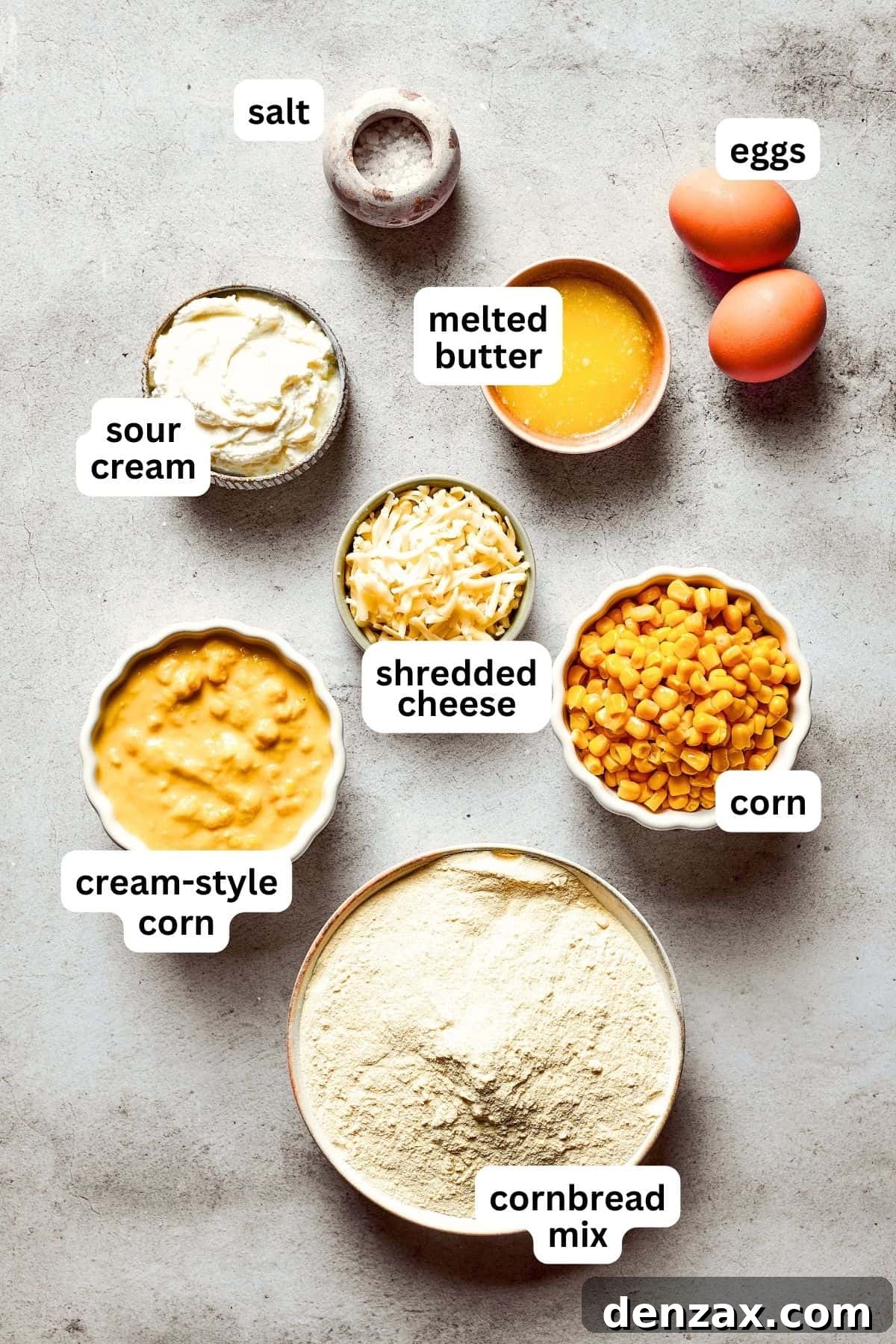 Corn Souffle is rich, creamy, and slightly sweet-savory. It's easily made with pantry and fridge staples, making it a great side dish. An overhead image of the ingredients used for Corn Souffle.
