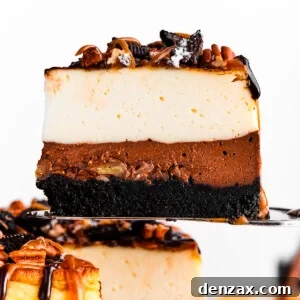 A cake server holding up a slice of turtle cheesecake.