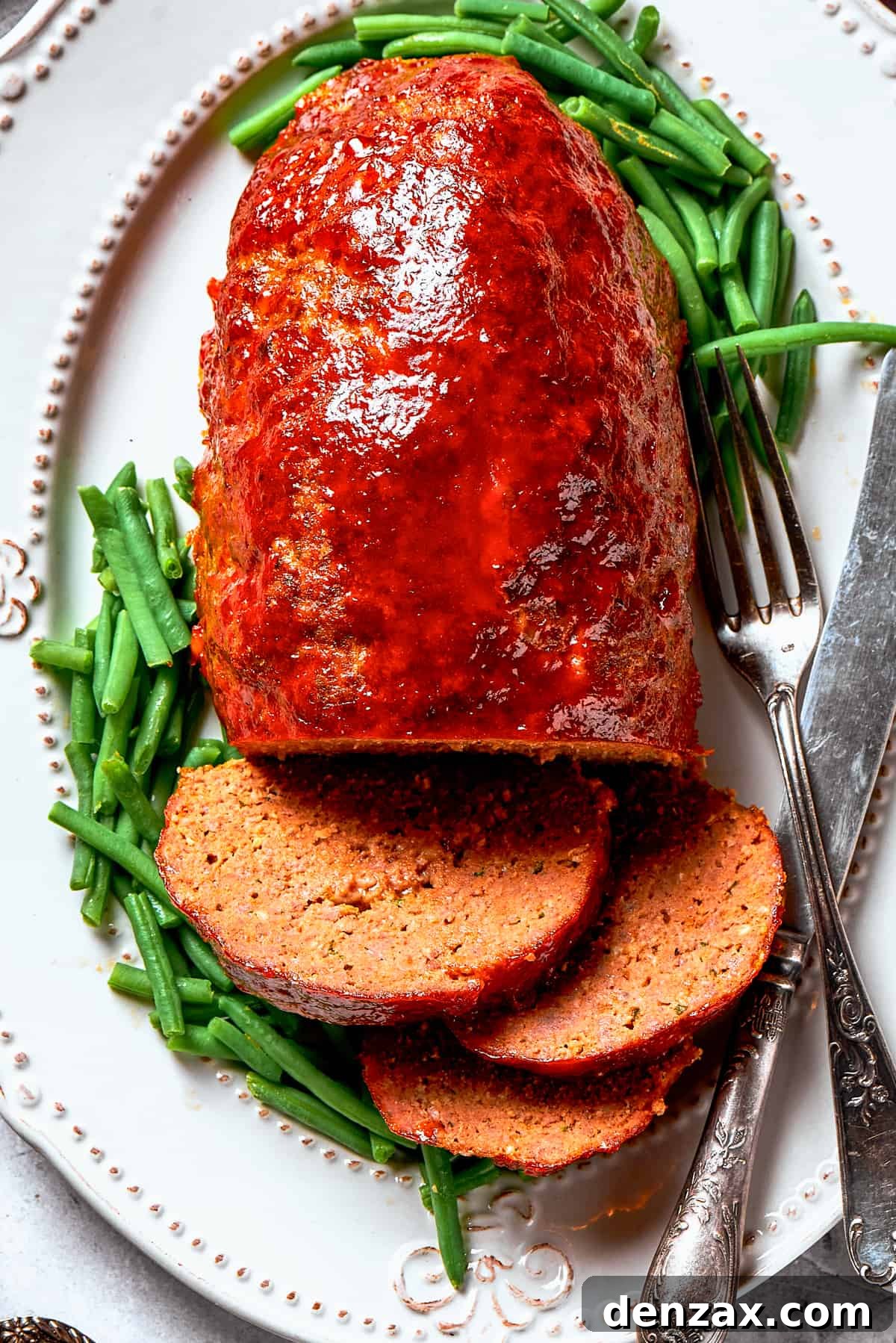 Overhead image of brown sugar meatloaf on a serving platter.