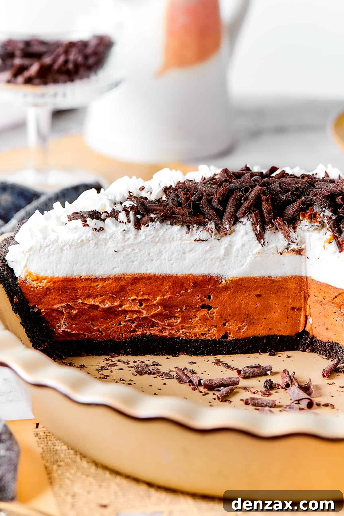 Pie in a plate with a layer of chocolate and a top layer of vanilla.