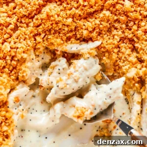 Creamy Poppy Seed Chicken Casserole Recipe — Easy Comfort Dinner 2 A casserole dish of poppy seed chicken.