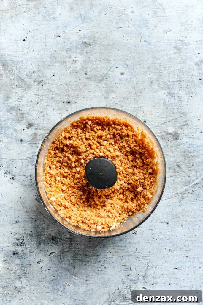 Cracker crumbs ready for topping. The crackers are processed into cumbs.