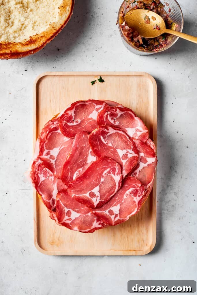Deli ham tops the pile.