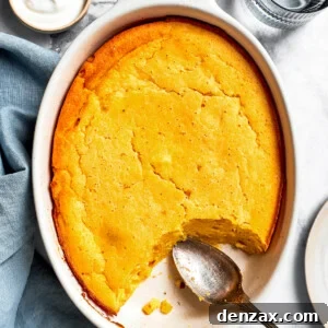 Overhead image of a baking dish with baked Spoon Bread.