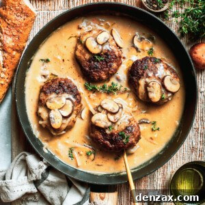 Four pieces of chopped steak are added to a pan with gravy.