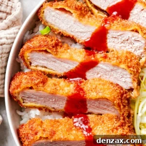 A close up of sliced pork katsu.