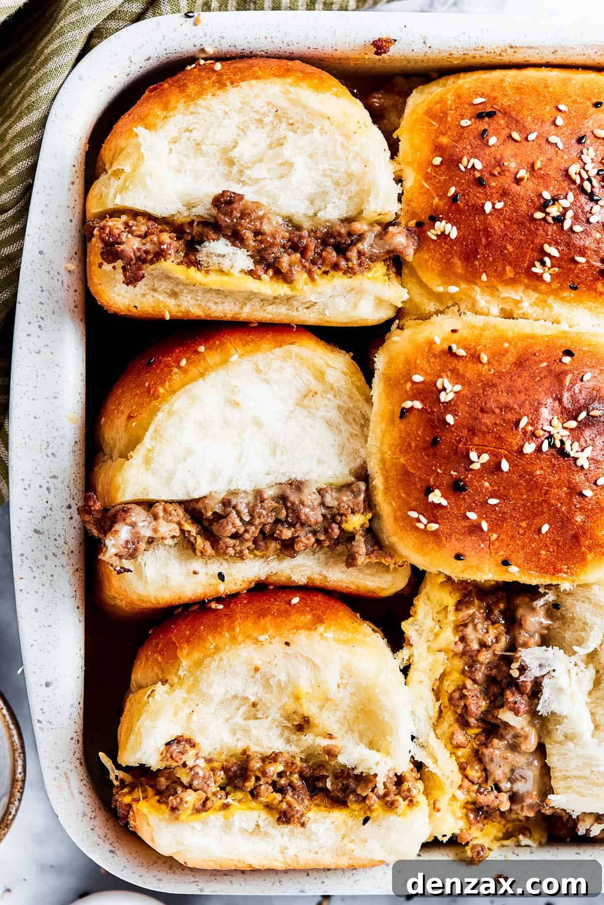 Three cheeseburger sliders. Three cheeseburger sliders.