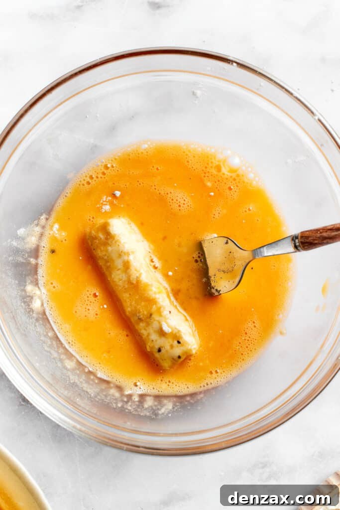 The cheese is added back to the egg.