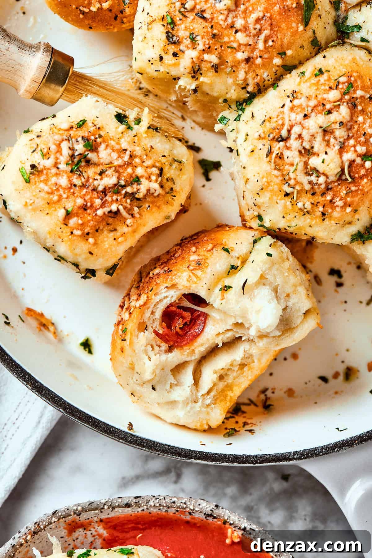 A few pizza bites are shown in a skillet.