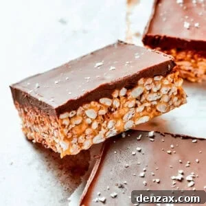 Peanut Butter Rice Krispie Treats: No-Bake Snack Recipe 2 A square bar of rice krispies topped with a layer of melted chocolate.