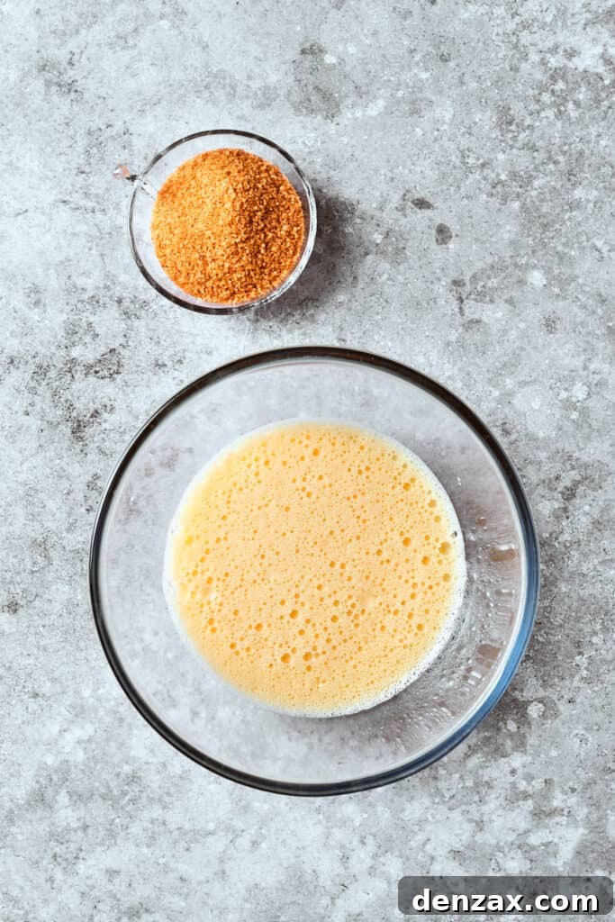 Butter and sour cream are mixed in a bowl.
