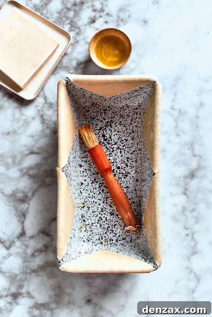 A loaf pan and a pastry brush.