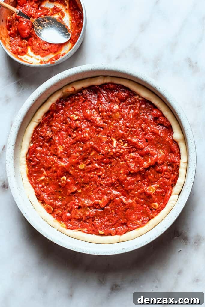 Sauce is added to the dough.
