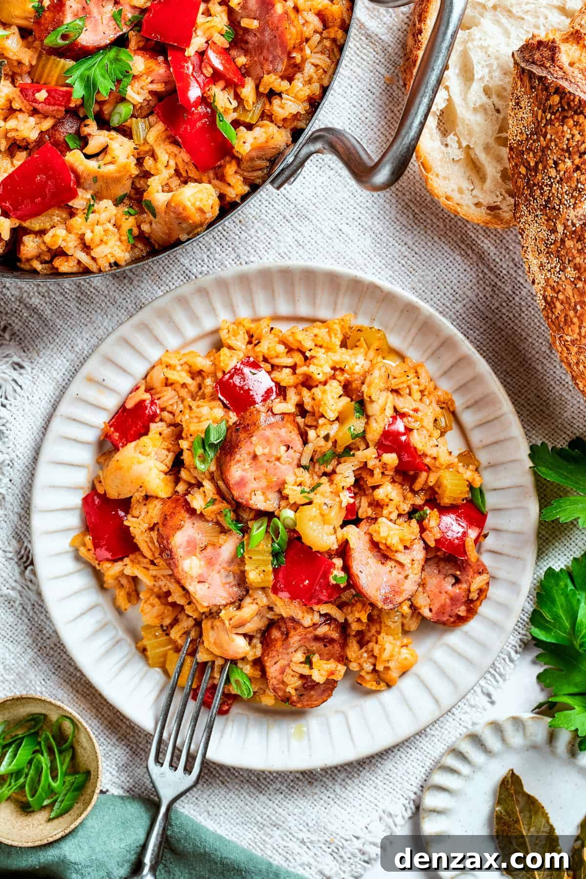 Jambalaya served on a dinner plate.