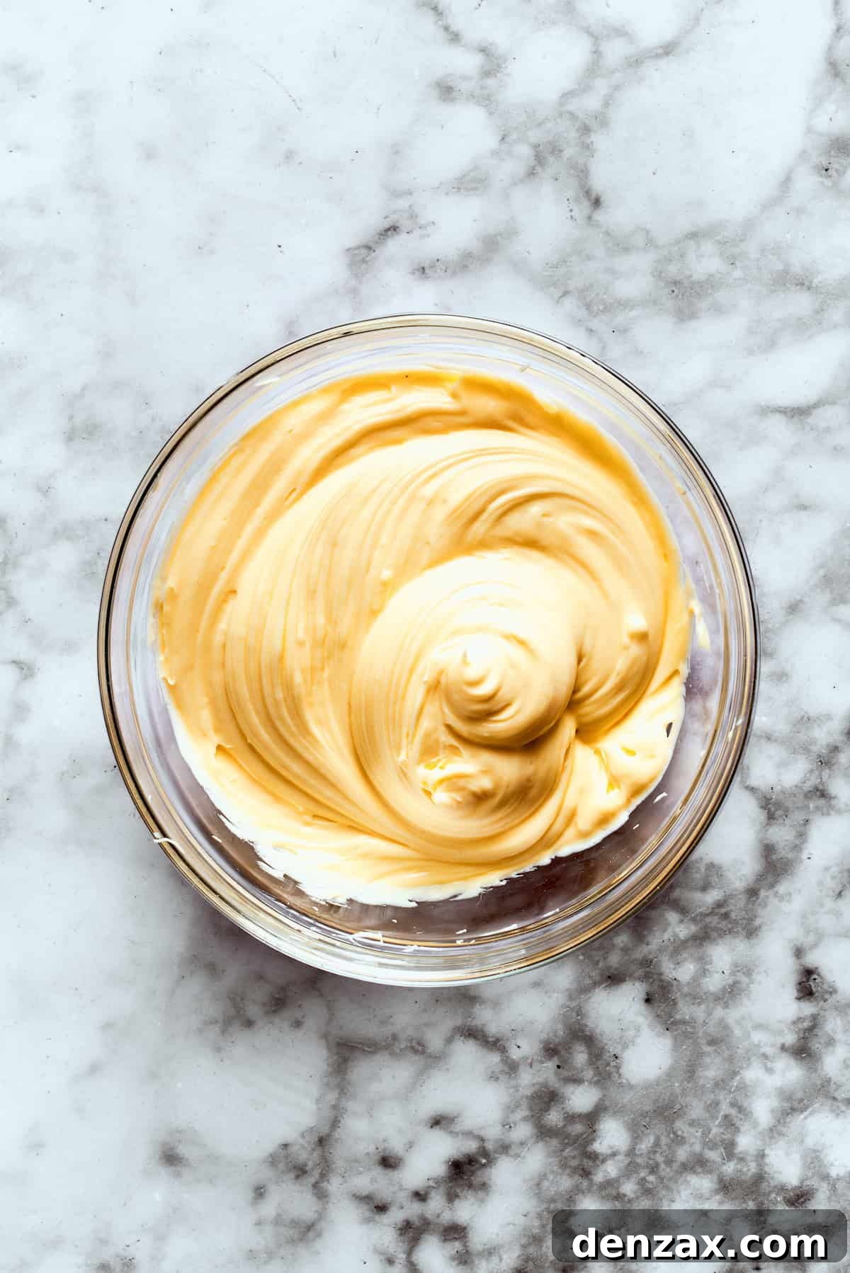 5. Whisk the vanilla pudding layer. Instant vanilla pudding in a bowl.