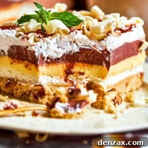 Decadent Layered Dessert Bars: Sex in a Pan Recipe 6 A side view of sex in a pan dessert with all the layers showing.