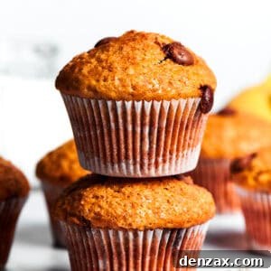 Two banana muffins, one put on top of the other.